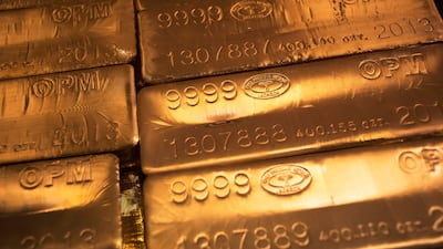 Gold edged higher after a slight dip in the greenback. Reuters