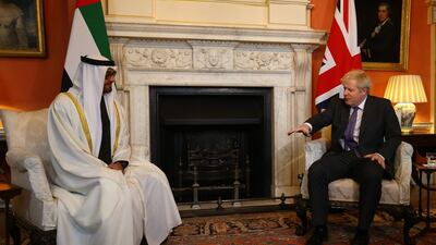 Crown Prince of Abu Dhabi and Deputy Supreme Commander of the Armed Forces, Sheikh Mohamed bin Zayed (l) in conversation with British Prime Minister Boris Johnson, who said his country was keen to bolster ties with the UAE. Getty Images