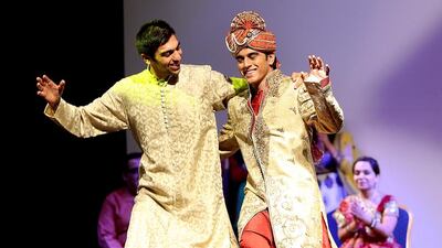 A dance group performs to the new music during the launch of the album at the Indian Consulate in Dubai. Satish Kumar / The National