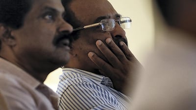 A congress supporters looks dejected at the Indian association in Sharjah, United Arab Emirates. Satish Kumar/ For the National