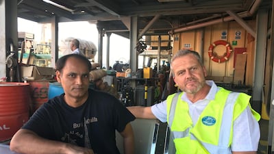 Vikash Mishra, left, with Rev Andy Bowerman of the Mission to Seafarers, a charity supporting abandoned crew in Dubai. Courtesy Mission to Seafarers