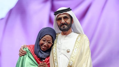 Sheikh Mohammed with Hadeel Anwar, winner of the 2018 Arab Reading Challenge. Photo: Wam