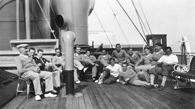 French national soccer team players pose after lunch for a group picture during their cruise aboard the "Conte Verde" in July 1930 on their way to Uruguay to participate in the first World Cup. AFP