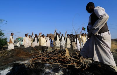 Sudanese people from the eastern Beja region block the main road of Port Sudan in protest against parts of the Juba Peace Agreement between rebel groups and the government. AFP