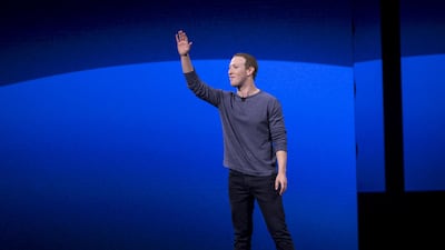 Mark Zuckerberg waves to attendees after speaking during the F8 Developers Conference where he unveiled Facebook's new features and developments. Bloomberg