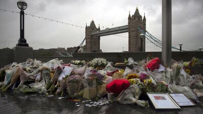 Flowers and tributes left at a makeshift memorial for victims of the London Bridge terror attacks. EPA
