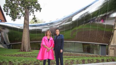 Architect Zaha Hadid (left) and Sheikha Mozah bint Nasser of Qatar standing infront of the extension to Oxford University’s Middle East Centre at the building’s opening. Courtesy University of Oxford/Photographers’ workshop