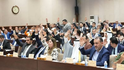 Iraqi lawmakers attend a parliamentary session to vote on the federal budget at the parliament headquarters in Baghdad, Iraq, June 11, 2023. Iraqi Parliament Media Office