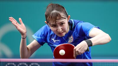 Hina Hayata of Japan in action during her women's round-of-32 match against Dina Meshref of Egypt. EPA
