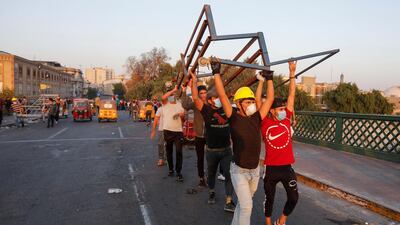 Demonstrators block Ahrar bridge in Baghdad. Reuters