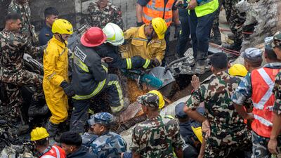 Rescue operations at the crash site. EPA