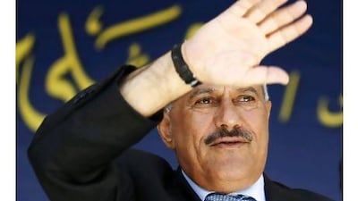 Yemen's President Ali Abdullah Saleh waves to supporters gathered in a soccer stadium where he delivered a speech saying he would draw up a new constitution to create a parliamentary system of government.