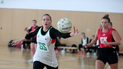 Action during the match between the UAE Falcons (white) and the All Stars (red) at Dubai College. Pawan Singh / The National