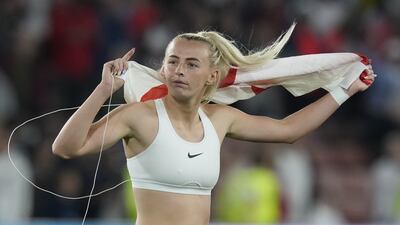 England's Chloe Kelly celebrates after the win. EPA