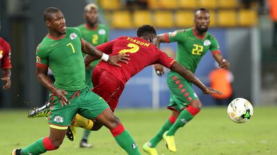 Burkina Faso's midfielder Prejuce Nakoulma, left. Steve Jordan / AFP