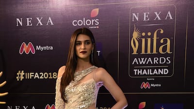 Kriti Sanon in Gaurav Gupta. AFP