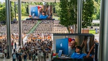 A crowd watches a WWDC presentation at Apple Park in Cupertino, California. EPA