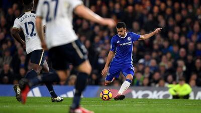 Pedro curls home Chelsea's equaliser on the way to a 2-1 victory over Tottenham Hotspur on Saturday evening. Shaun Botterill / Getty Images