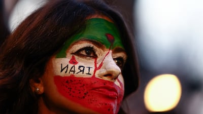 A woman takes part in a rally on Capitoline Hill, Rome, held in support of nationwide protests in Iran. Reuters