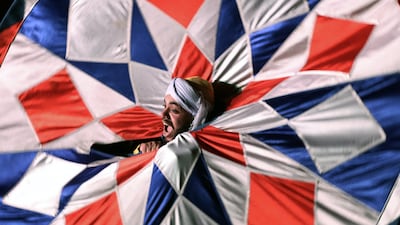 Egyptian dancers spin tanoura skirts during Ramadan Festival at Al Ghoury Palace in Cairo, Egypt. EPA