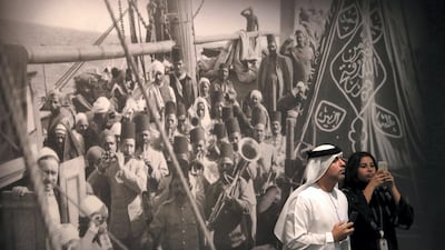 Visitors attend an exhibition at Sheikh Zayed Grand Mosque. Chris Whiteoak / The National