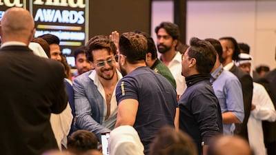 Tiger Shroff greenting fans at the event in Etihad Arena.