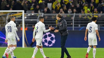 Thomas Tuchel shakes hands with his players after the end of the match. AFP