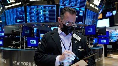 A trader on the floor of the New York Stock Exchange. Stocks rallied on Wall Street as investors hoped that the Omicron coronavirus variant will not pose a big economic threat. AP