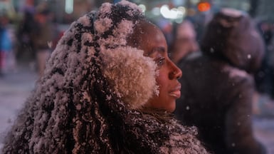 Snow clings to a woman’s hair during a winter storm in New York, New York, USA, 26 December 2025. A weather emergency was declared as up to 11 inches of snow was forecast, and hundreds of flights were grounded at New York-area airports. EPA / OLGA FEDOROVA