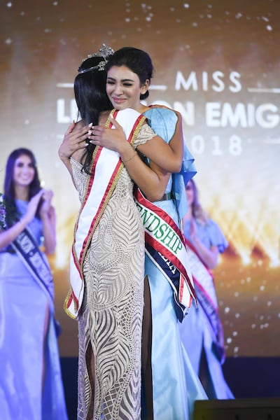 Australia’s Rachel Younan hugs the former Miss Lebanon Emigrant as she is announced this year's winner. The 23-year-old triumphed over 10 other finalists from around the world, all of whom have Lebanese heritage, at a ceremony held in Pattaya, Thailand.
