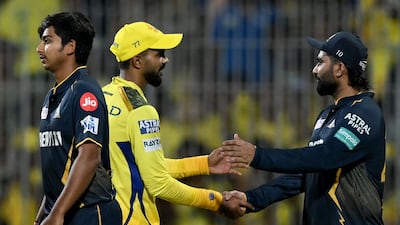 Chennai Super Kings' captain Ruturaj Gaikwad shakes hands with Gujarat players after Chennai's 63-run win. AFP