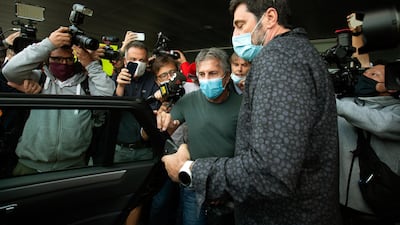 Lionel Messi's father and representative Jorge Messi (C) arrives at El Prat Airport in Barcelona. EPA