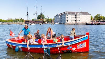 Plastic Whale has 40 skippers and a fleet of 10 boats to scoop plastic waste from Amsterdam’s 165 canals. Courtesy Plastic Whale