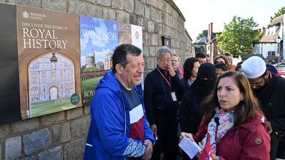 The mood was buoyant yet sombre. AFP