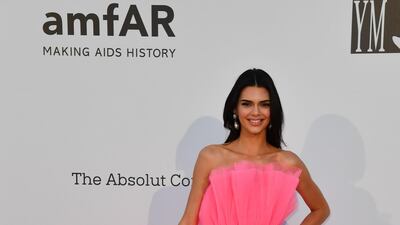 A new collection by Giambattista Valli for high street brand H&M was announced as Kendall Jenner posed in one of the affordable pieces on the amfAR red carpet. Photo: AFP