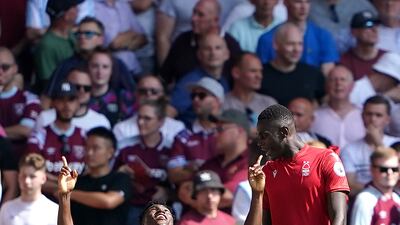 Taiwo Awoniyi celebrates with Moussa Niakhate. PA