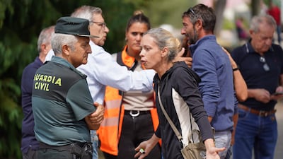 Residents of villages severely affected by wildfires protest against not being allowed to enter Guardo, in Spain's Palencia province. AFP