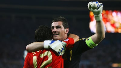 Iker Casillas, right, celebrates with teammate Santi Cazorla during Spain's 2008 European Championship title run. Shaun Botterill / Getty Images