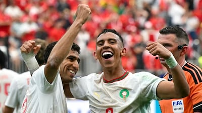 Morocco's Achraf Hakimi and Soufiane Rahimi celebrate after beating Canada 3-0 in Houston to qualify for the last 16. AFP