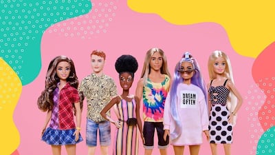 The newest additions to Barbie's Fashionista ine include a doll with alopecia, centre, and a redheaded Ken. Instagram / Barbie
