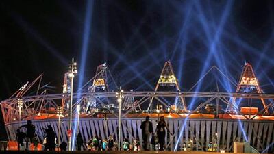 Spectators attend a rehearsal for the 2012 London Olympics opening ceremony