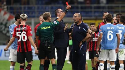 Referee Daniele Chiffi shows a red card to Lazio manager Maurizio Sarri at the end of the match. Getty