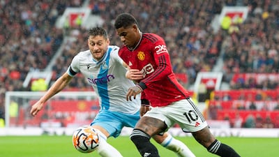 Crystal Palace's Joel Ward battles for the ball with Manchester United's Marcus Rashford. EPA