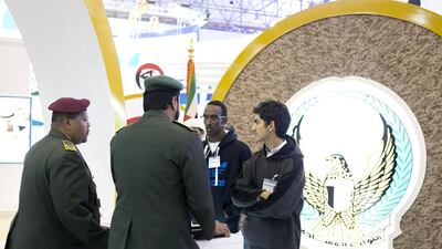 Students at the Armed Forces stall at the National Career Exhibition at Sharjah Expo Centre. Reem Mohammed / The National