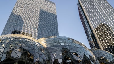 Corporate office buildings rise above The Spheres at the Amazon headquarters in Seattle. Getty Images