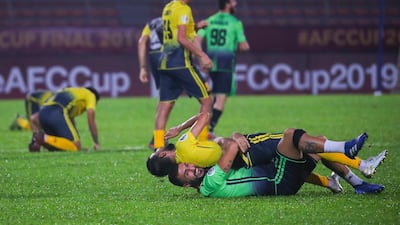 Al Ahed players celebrate at the final whistle after winning AFC Cup Final against April 25 Sports Club of North Korea in Kuala Lumpur. EPA