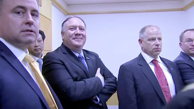 US Secretary of State Mike Pompeo listens on as President Donald Trump speaks with North Korean leader Kim Jong-un. Reuters