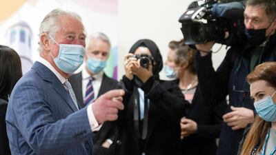 Prince Charles tours the vaccination centre at Finsbury Park Mosque. AFP
