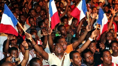 Jubilant citizens of Mayotte celebrate the referendum vote that overwhelmingly supported the island becoming a French departément.