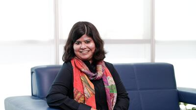 Arundhoti Banerjee of Xpress Money tracks currency fluctuations, remitting money to India whenever the rupee weakens against the dollar. Victor Besa / The National